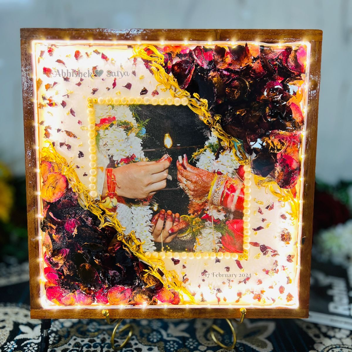 Wooden Square-shaped LED Frame with Preserved Red Petals, White pearls & Couple Photo