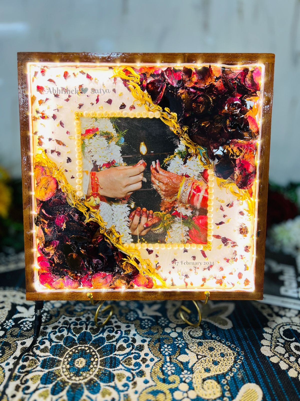Wooden Square-shaped LED Frame with Preserved Red Petals, White pearls & Couple Photo