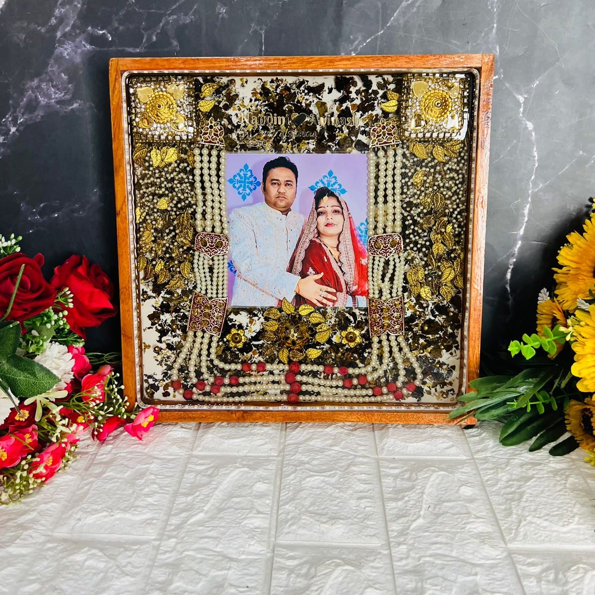 Square teakwood frame with wedding varmala and photo