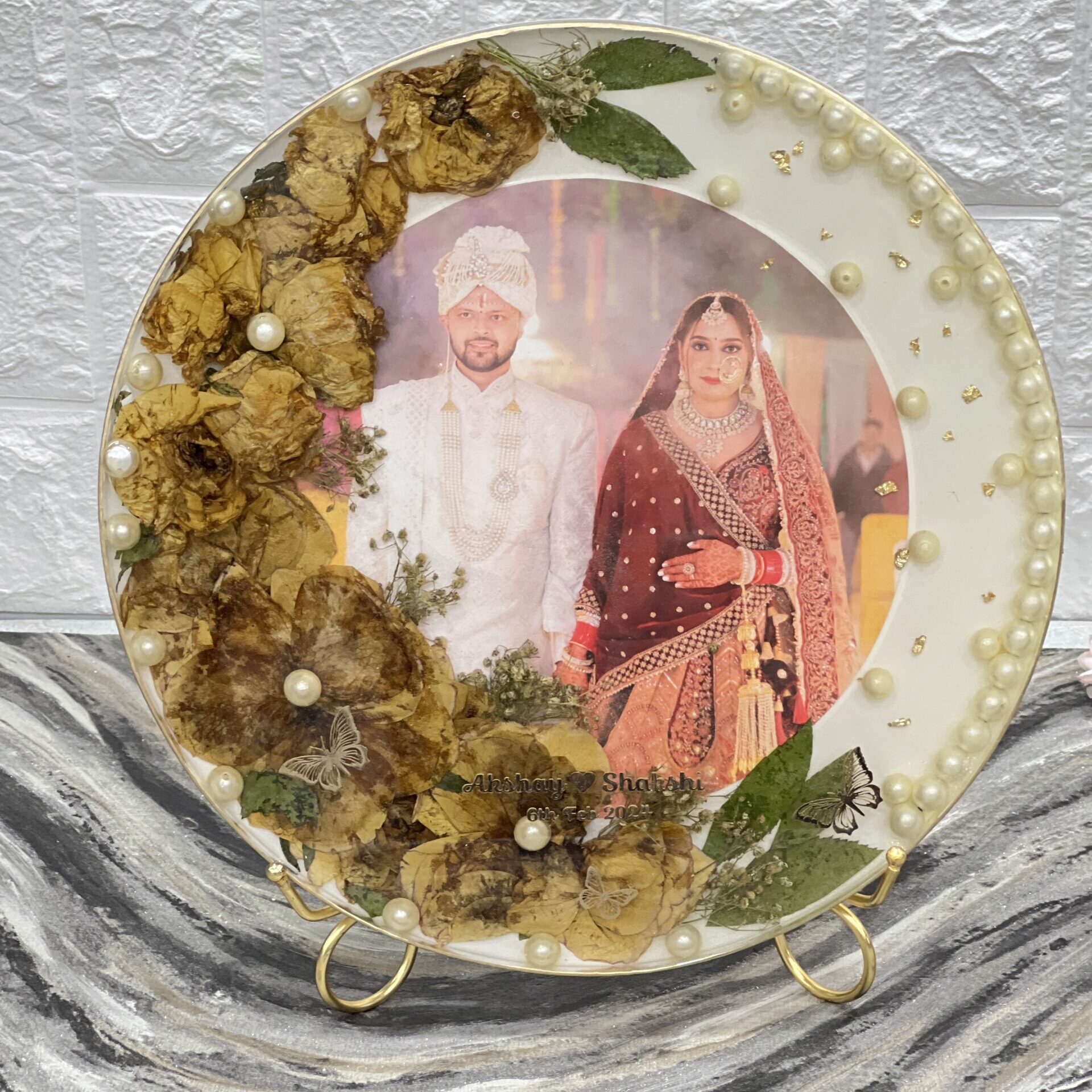 Round deep casting frame with yellow varmala flowers