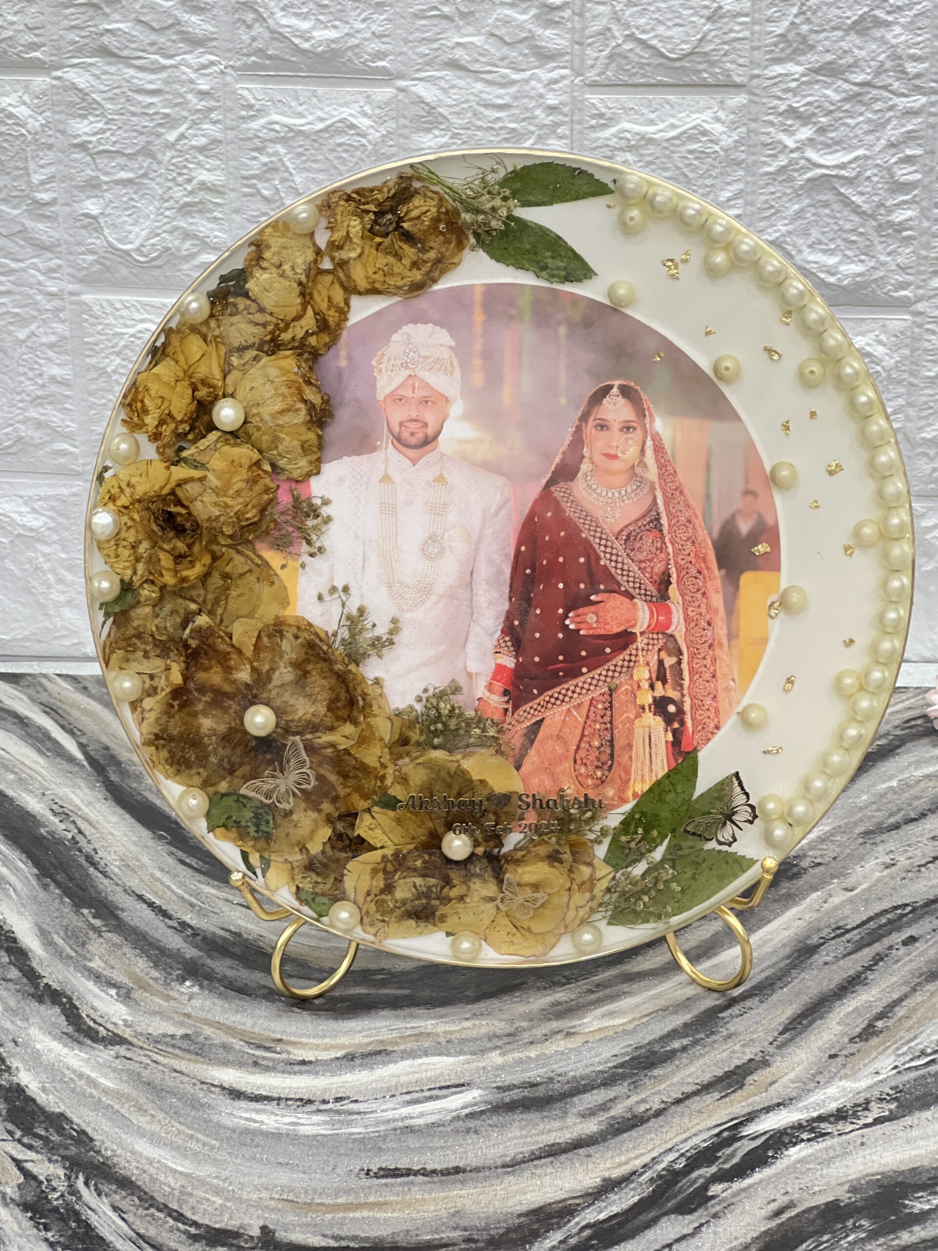 Round deep casting frame with yellow varmala flowers