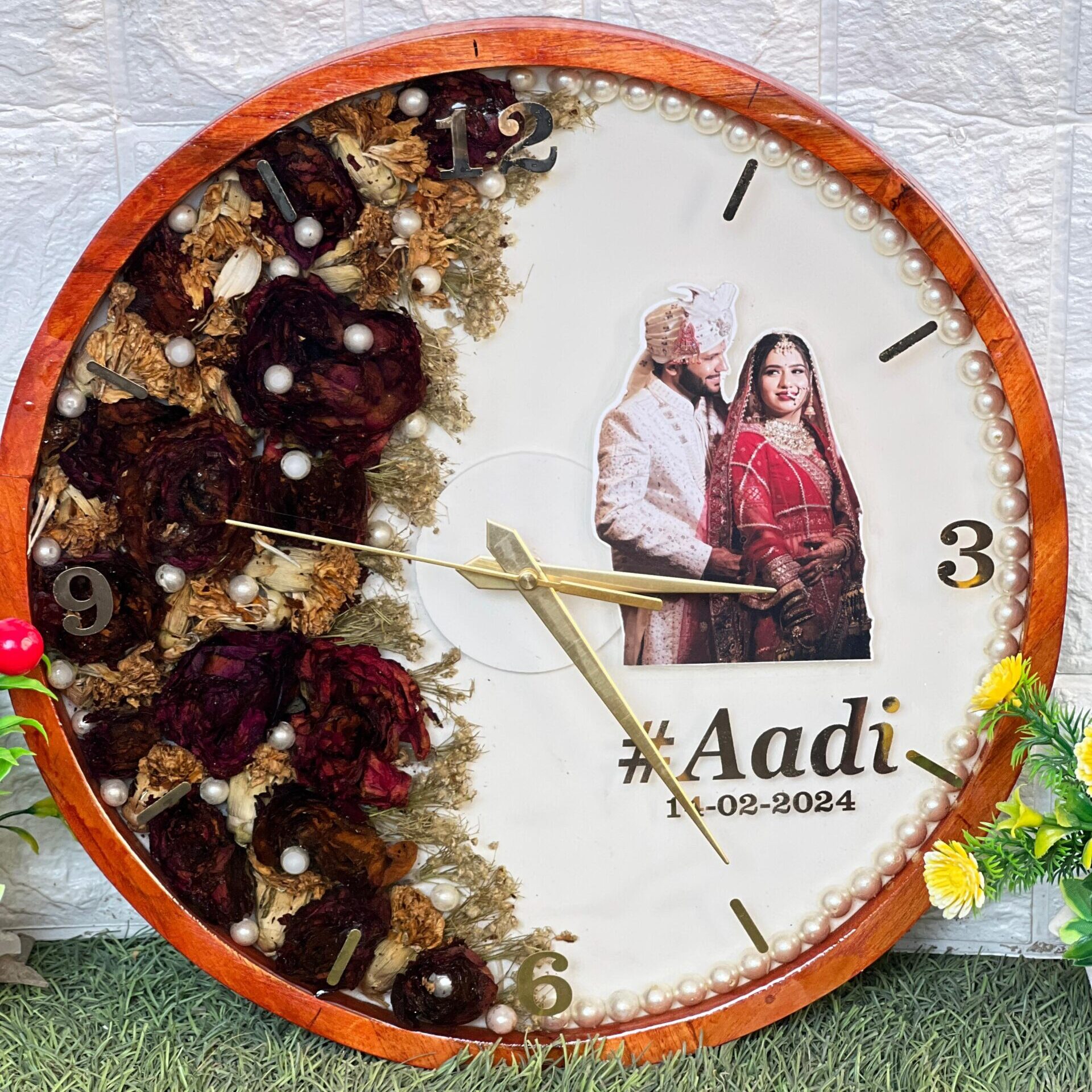 Resin clock with real varmala flowers