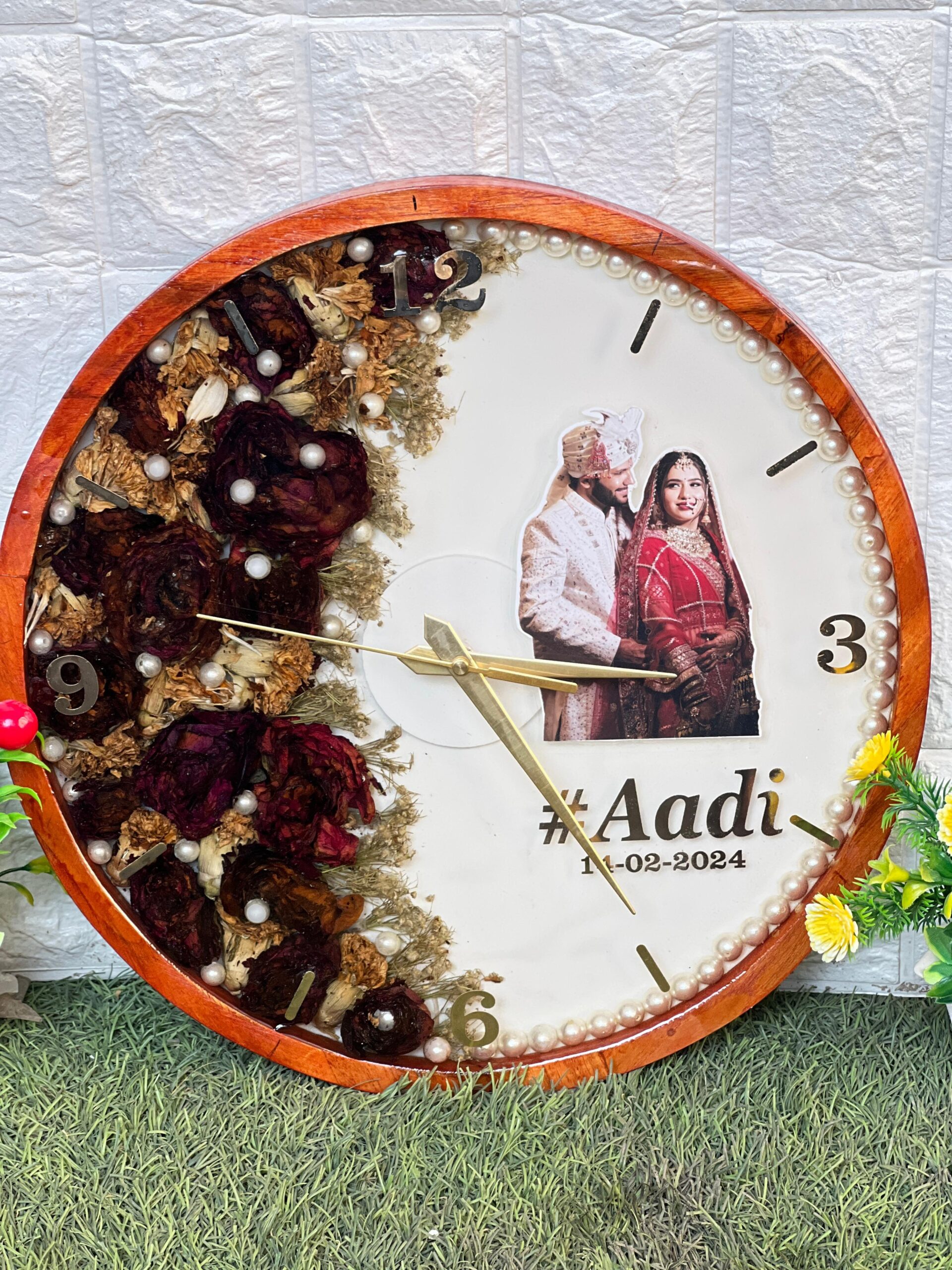 Resin clock with real varmala flowers