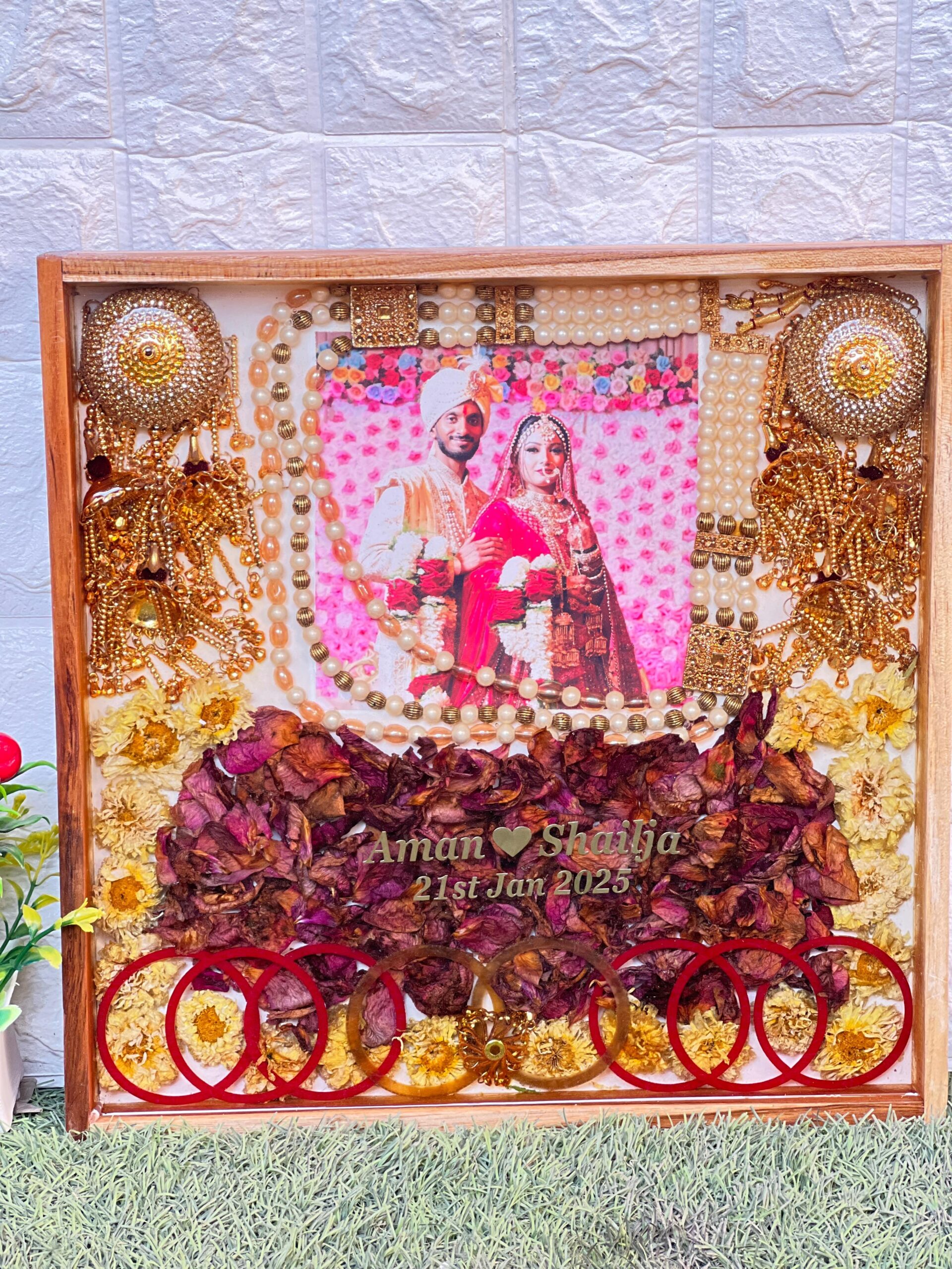 resin frame with preserved wedding items