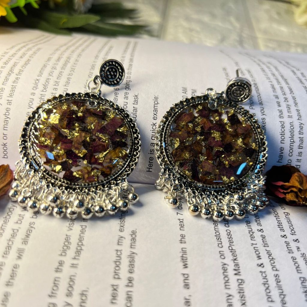 Handmade resin jhumkas with preserved real flowers, custom floral earrings