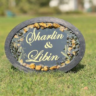 Oval resin nameplate with varmala preservation and couple's names