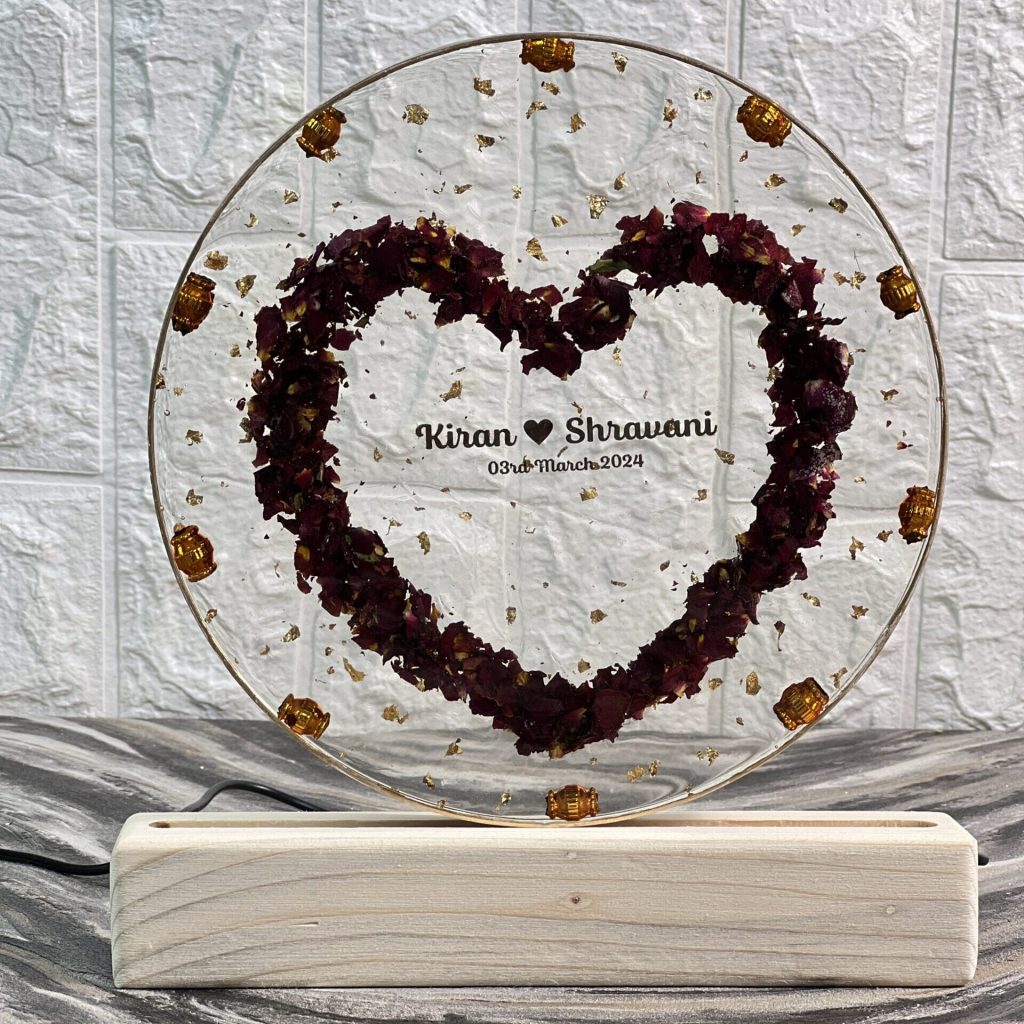 8-inch round resin frame with varmala flower preservation, names & wedding date on LED stand