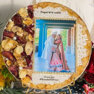 10-inch round frame with red & yellow petals, pearls, and couple photo