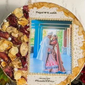 10-inch round frame with red & yellow petals, pearls, and couple photo