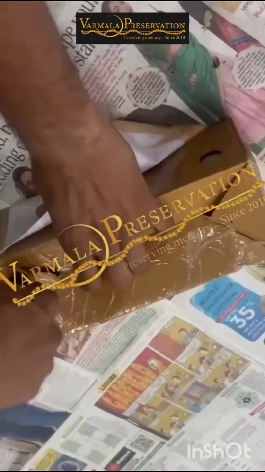 Setting the varmala flower layout by hand before resin